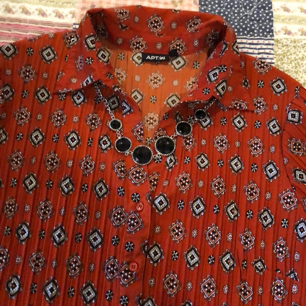 Beautiful button up blouse.